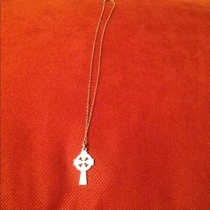 A genuine cross 925k sterling silver necklace.